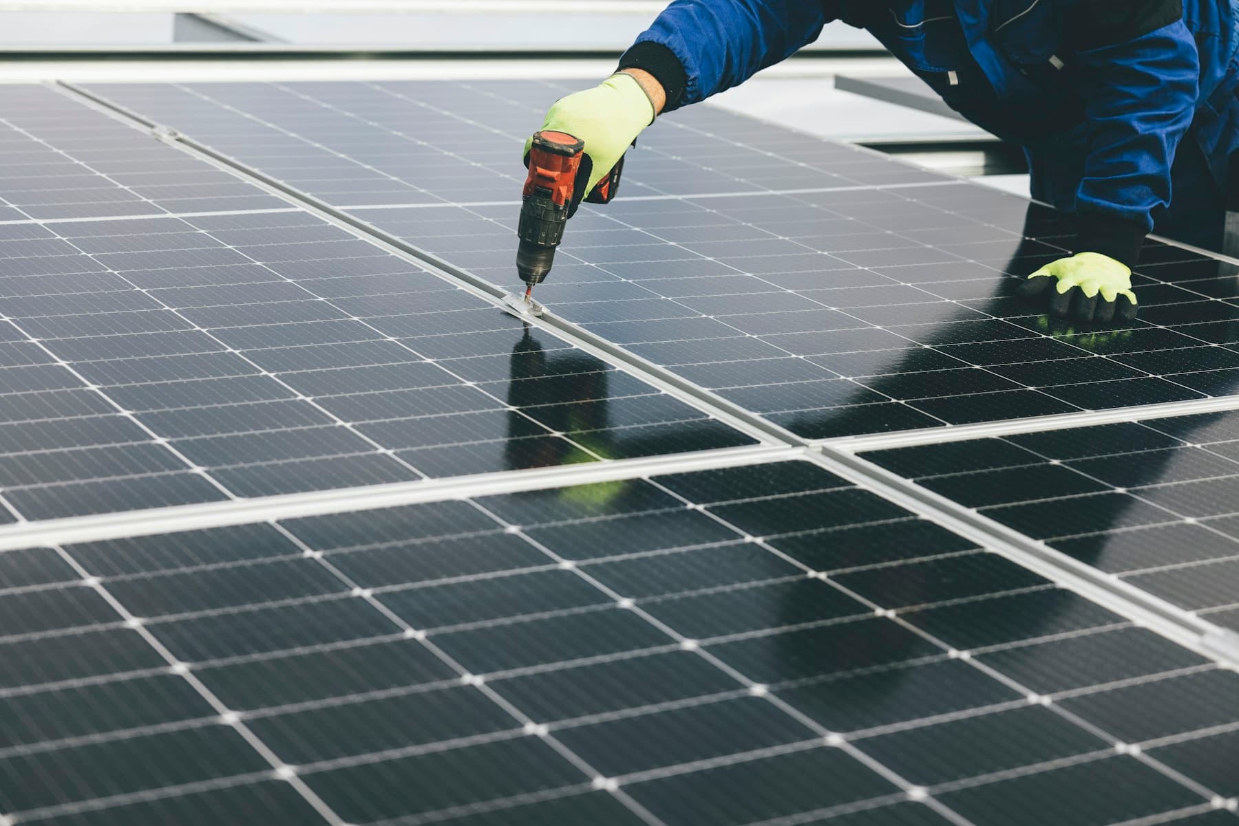 Engineer installing solar panels